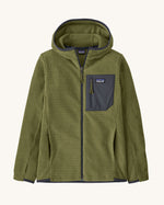 Patagonia high performance kids R1 air hoody in green. Shows full length zip, thumb hole, side and chest pockets