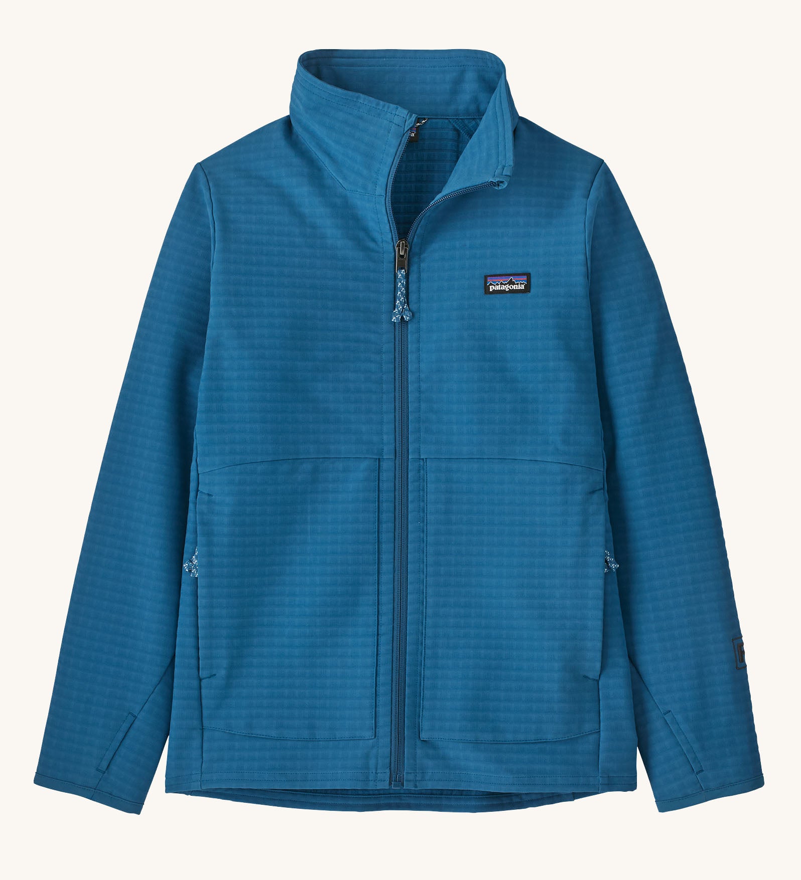Patagonia kid's R1 tech face jacket in aqua blue. Shows full length front zip, side pockets and thumb holes