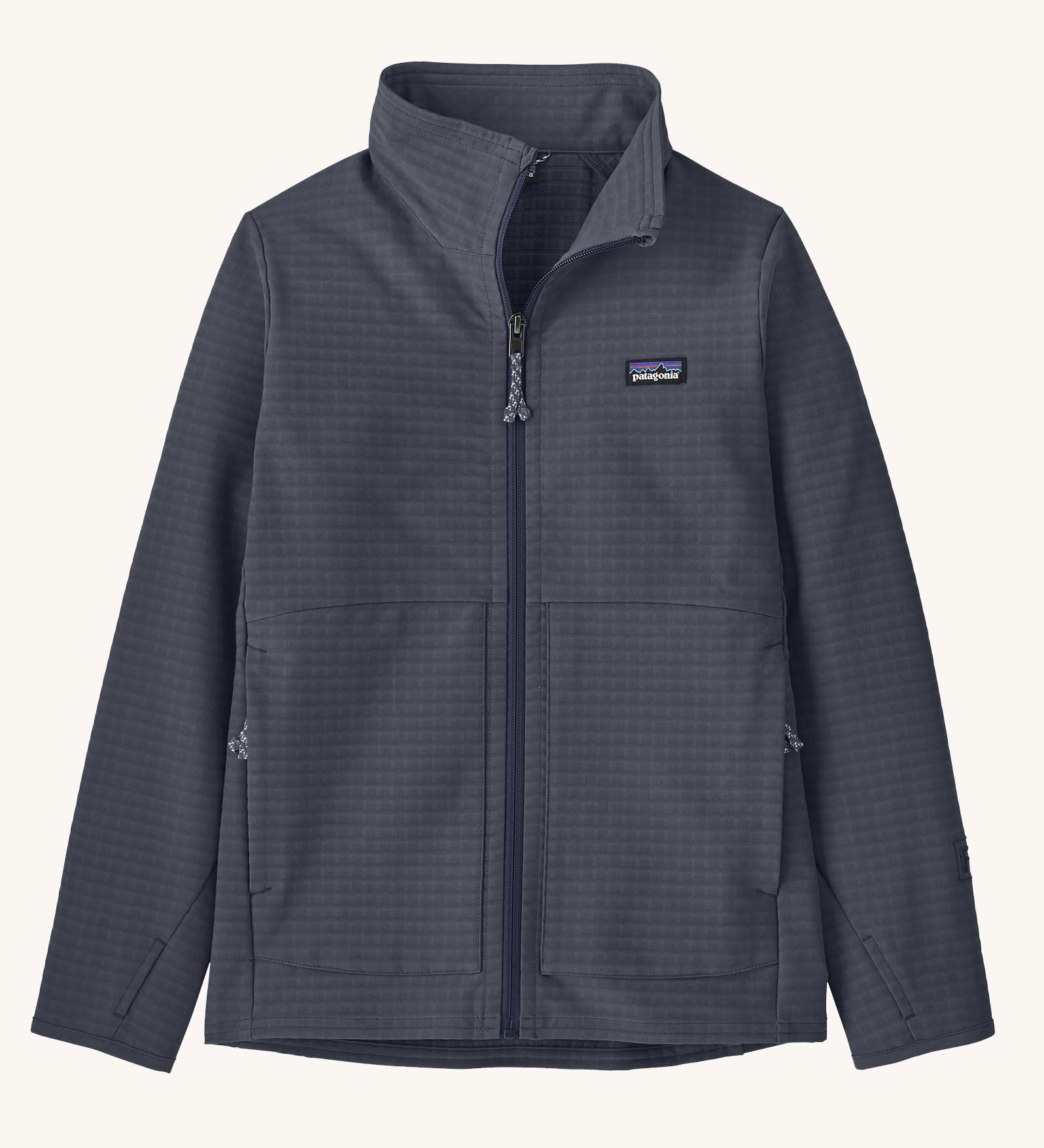 Patagonia kid's R1 tech face jacket in dark navy. Shows full length front zip, side pockets and thumb holes