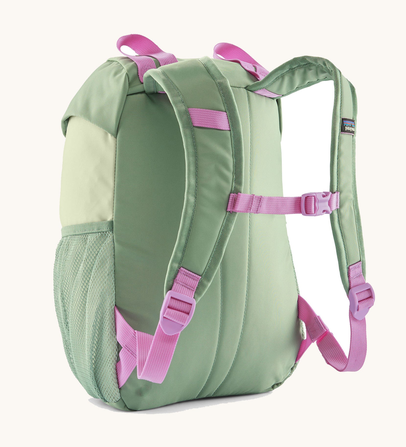 The back of the the Patagonia Kids Refugito 12L Backpack  in ellwood green, showing the padded shoulder strap with pink detail and mesh side pocket