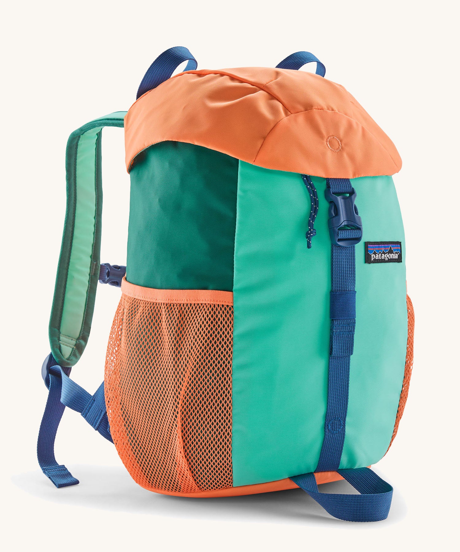 Patagonia kids refugito 12L day pack in green and pale orange block colour. Shows front buckle lid fastener and mesh pockets