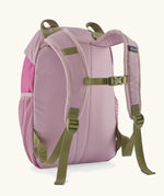 Back of Patagonia kids refugito 12L day pack in pale purple showing green quick release buckle strap between shoulder straps