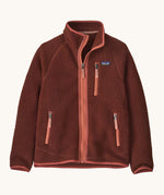 Patagonia kids retro pile fleece jacket in dried vanilla available at Babipur. A 100% recycled polyester thick fleece in dark red with pale red trim. Features a turn up collar, full length zip, 2 side zip pockets and chest pocket.