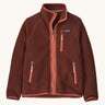 Patagonia kids retro pile fleece jacket in dried vanilla available at Babipur. A 100% recycled polyester thick fleece in dark red with pale red trim. Features a turn up collar, full length zip, 2 side zip pockets and chest pocket.