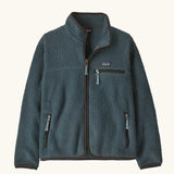 Patagonia Kids Retro Pile Jacket in Summit Blue. Slate fleece body with three zip pockets and darker binding.