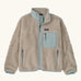 Patagonia Kids Retro X Fleece Jacket in Natural with Virtually blue. Cream fleece with contrasting pale blue binding, collar and square chest pocket.