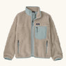 Patagonia Kids Retro X Fleece Jacket in Natural with Virtually blue. Cream fleece with contrasting pale blue binding, collar and square chest pocket.