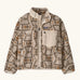 Patagonia Kids Retro X Fleece Jacket in snowshoe Hare, Natural. Cream fleece base with a beige and brown tortoiseshell-style pattern, and a cream square chest pocket.