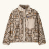 Patagonia Kids Retro X Fleece Jacket in snowshoe Hare, Natural. Cream fleece base with a beige and brown tortoiseshell-style pattern, and a cream square chest pocket.