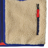 Patagonia kids retro x vest in dark natural showing close up side zipped pocket