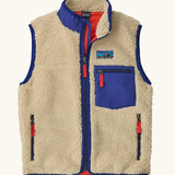 Patagonia kids retro x vest in dark natural. A 100% recycled polyester and pile fleece gilet with dark blue trim. Features a full length zip, 2 side pockets and a small chest pocket
