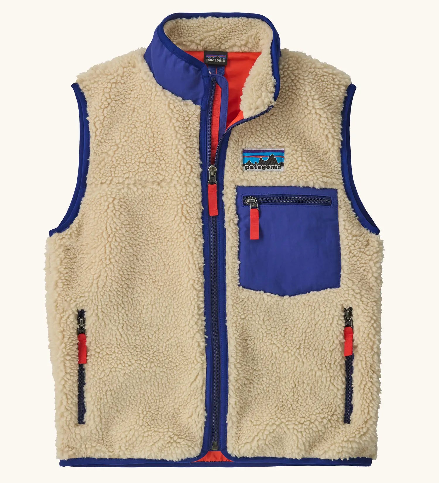 Patagonia kids retro x vest in dark natural. A 100% recycled polyester and pile fleece gilet with dark blue trim. Features a full length zip, 2 side pockets and a small chest pocket