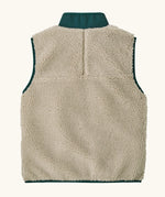 Back of Patagonia kids retro x vest in dark natural showing pile fleece body and greeb turned up collar