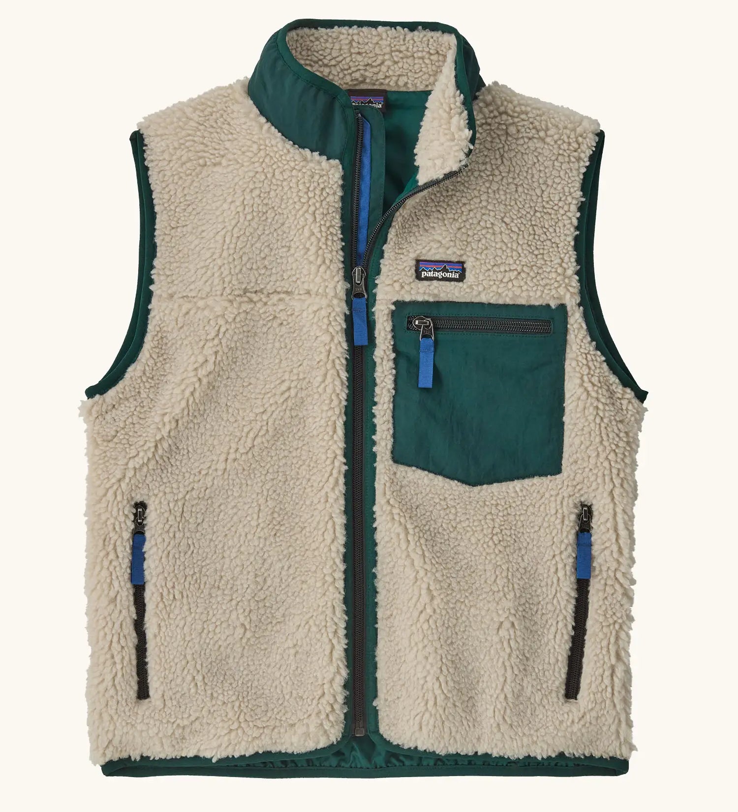 Patagonia kids retro x vest. A 100% recycled polyester and pile fleece gilet with dark green trim. Features a full length zip, 2 side pockets and a small chest pocket