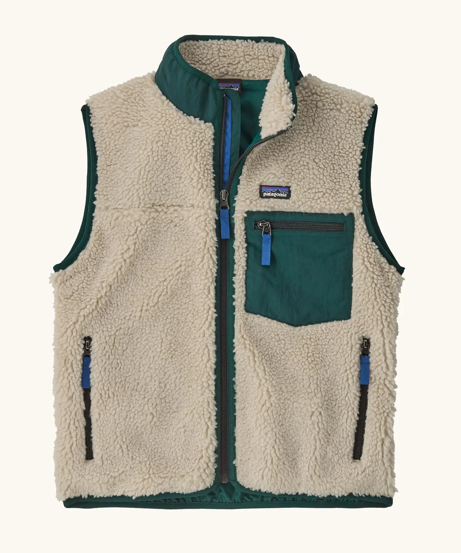 Patagonia kids retro x vest. A 100% recycled polyester and pile fleece gilet with dark green trim. Features a full length zip, 2 side pockets and a small chest pocket