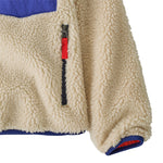 Patagonia kids retro x jacket in dark natural available at Babipur showing the side pocket and cuff detail