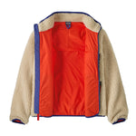 Patagonia kids retro x jacket in dark natural available at Babipur showing the bright orange inner liner detail