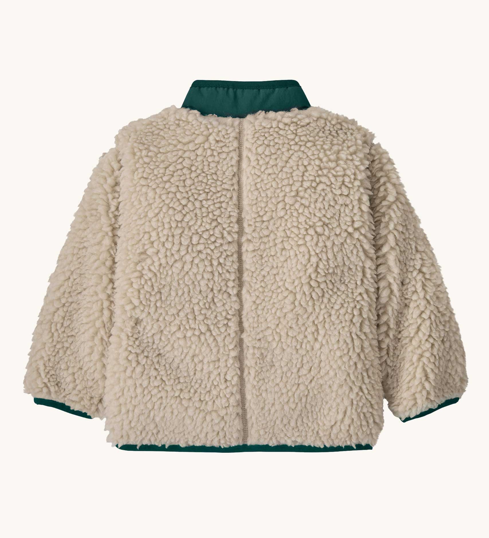 The back of the Patagonia little kids retro x jacket in dark natural/cascade green available at Babipur. A 100% recycled polyester and pile fleece jacket in cream with dark green trim. Features a full length zip, 2 side pockets and a chest pocket.