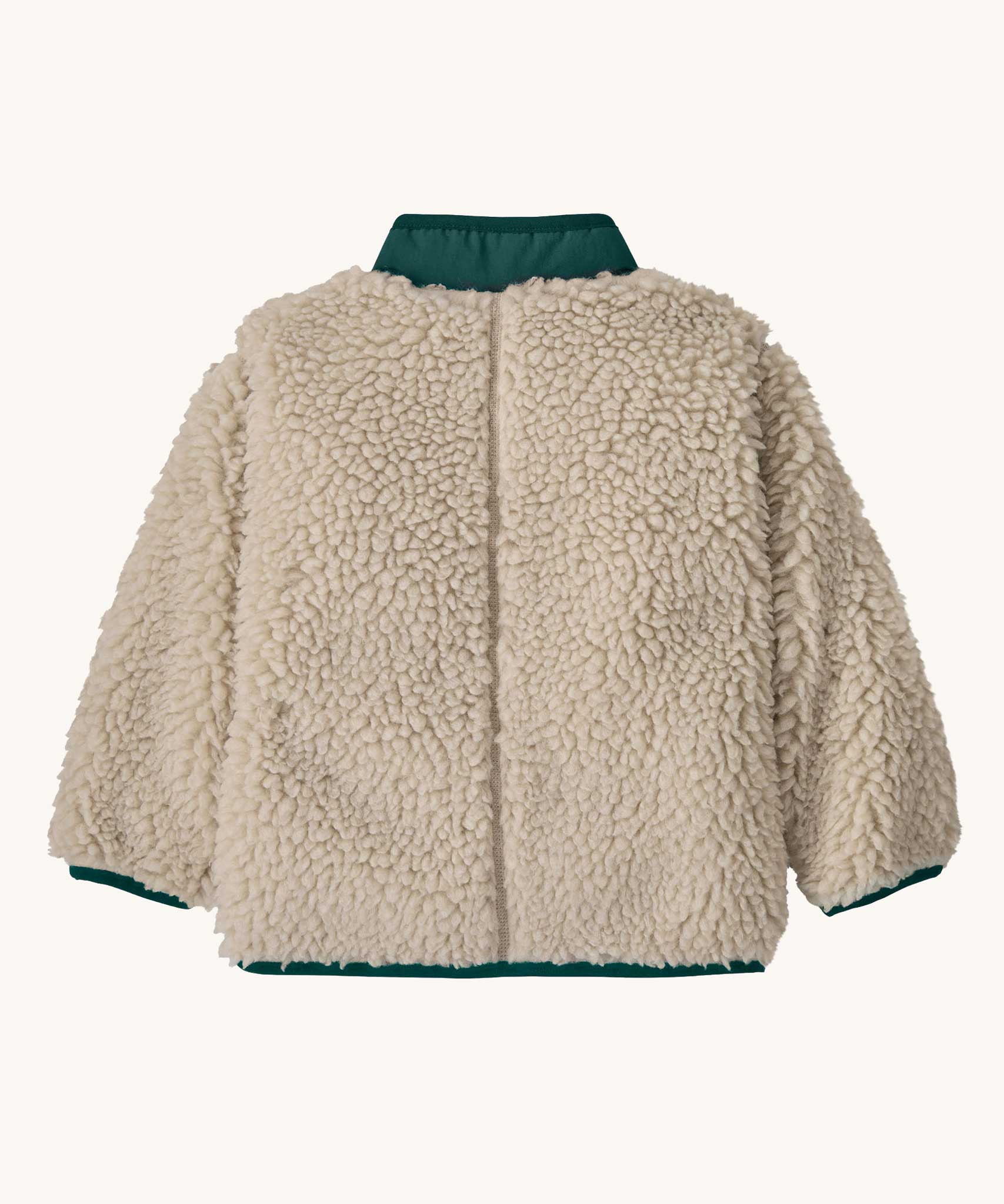 The back of the Patagonia little kids retro x jacket in dark natural/cascade green available at Babipur. A 100% recycled polyester and pile fleece jacket in cream with dark green trim. Features a full length zip, 2 side pockets and a chest pocket.