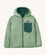 Patagonia Kids Reversible Down Hoody in ellwood green available at Babipur showing the grey green reverse side. Features a full length zip, 2 side pockets and a chest pocket.