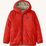 Patagonia Kids Reversible Ready Freddy Hoody in the Amanita red colour way. The kids coat is shown with the red water resistant shell on the outside.  We're proud stockists of Patagonia here at Babipur.