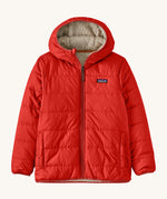 Patagonia Kids Reversible Ready Freddy Hoody in the Amanita red colour way. The kids coat is shown with the red water resistant shell on the outside.  We're proud stockists of Patagonia here at Babipur.