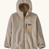 Patagonia kids reversible ready freddy hoody in oar tan shown on the fleece side with beige zipped chest pocket.