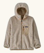Patagonia kids reversible ready freddy hoody in oar tan shown on the fleece side with beige zipped chest pocket.