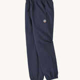 A side image of the Patagonia Kids Sweatpants in a Fitz Roy Icon New Navy colour way available at Babipur. 