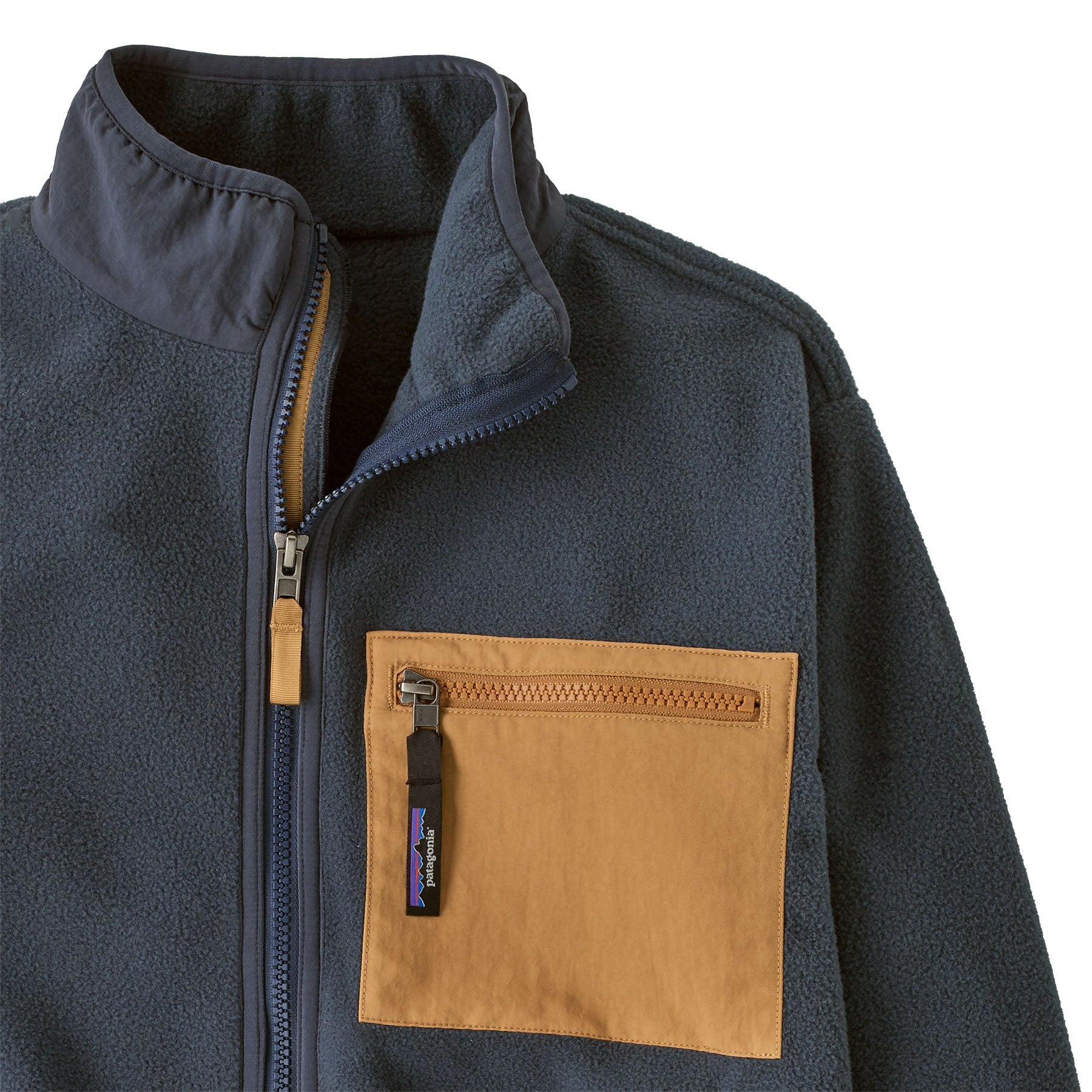 Patagonia kids synchilla fleece jacket in smolder blue available at Babipur showing chest pocket and zip detail