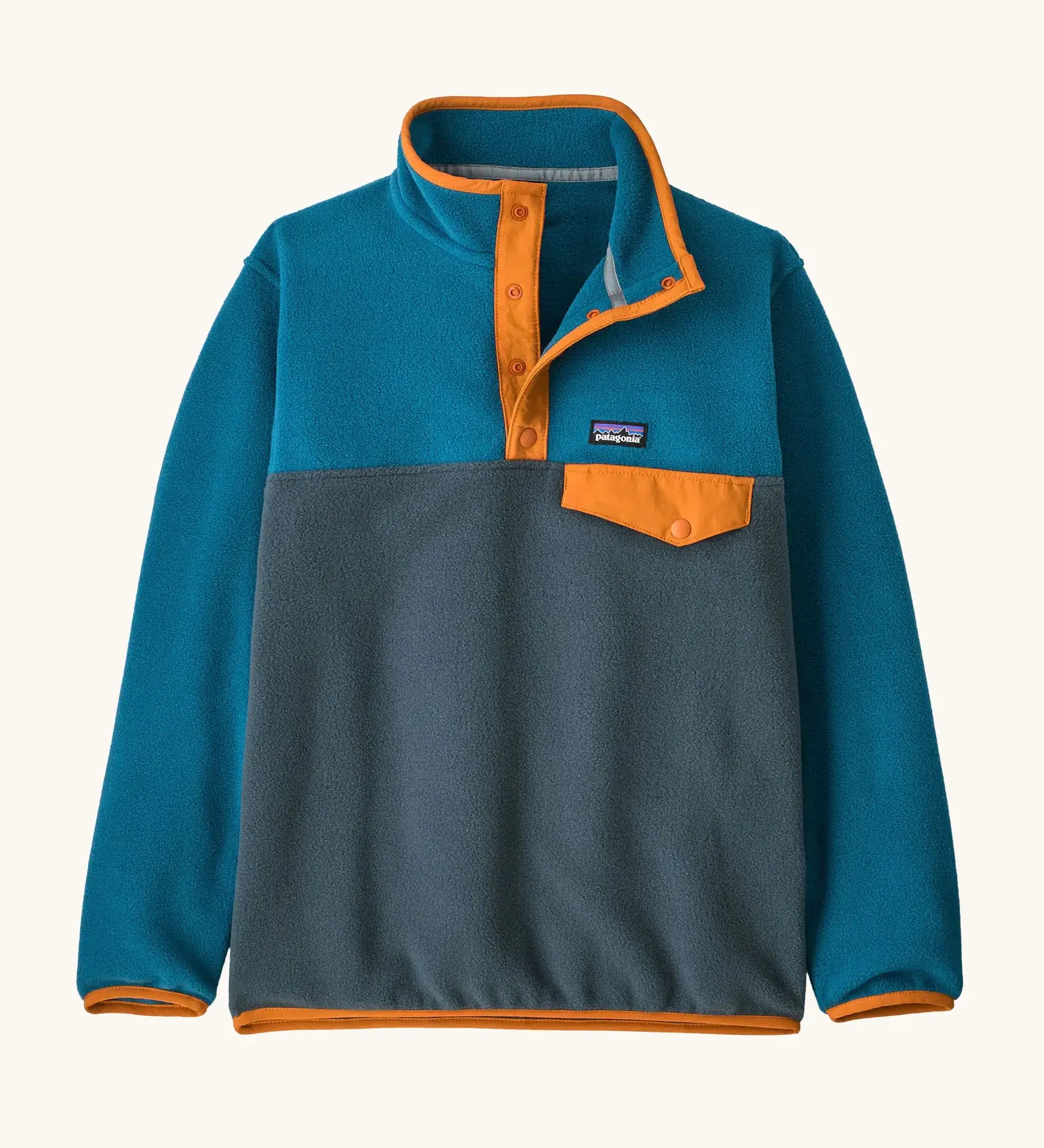 Patagonia Kids Lightweight Synchilla Snap-T Fleece Pullover in Summit Blue. Slate blue bottom half, ocean blue shoulders, sleeves, and collar, with an orange snap placket and matching orange chest pocket flap and buttons.