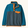 Patagonia Kids Lightweight Synchilla Snap-T Fleece Pullover in Summit Blue. Slate blue bottom half, ocean blue shoulders, sleeves, and collar, with an orange snap placket and matching orange chest pocket flap and buttons.