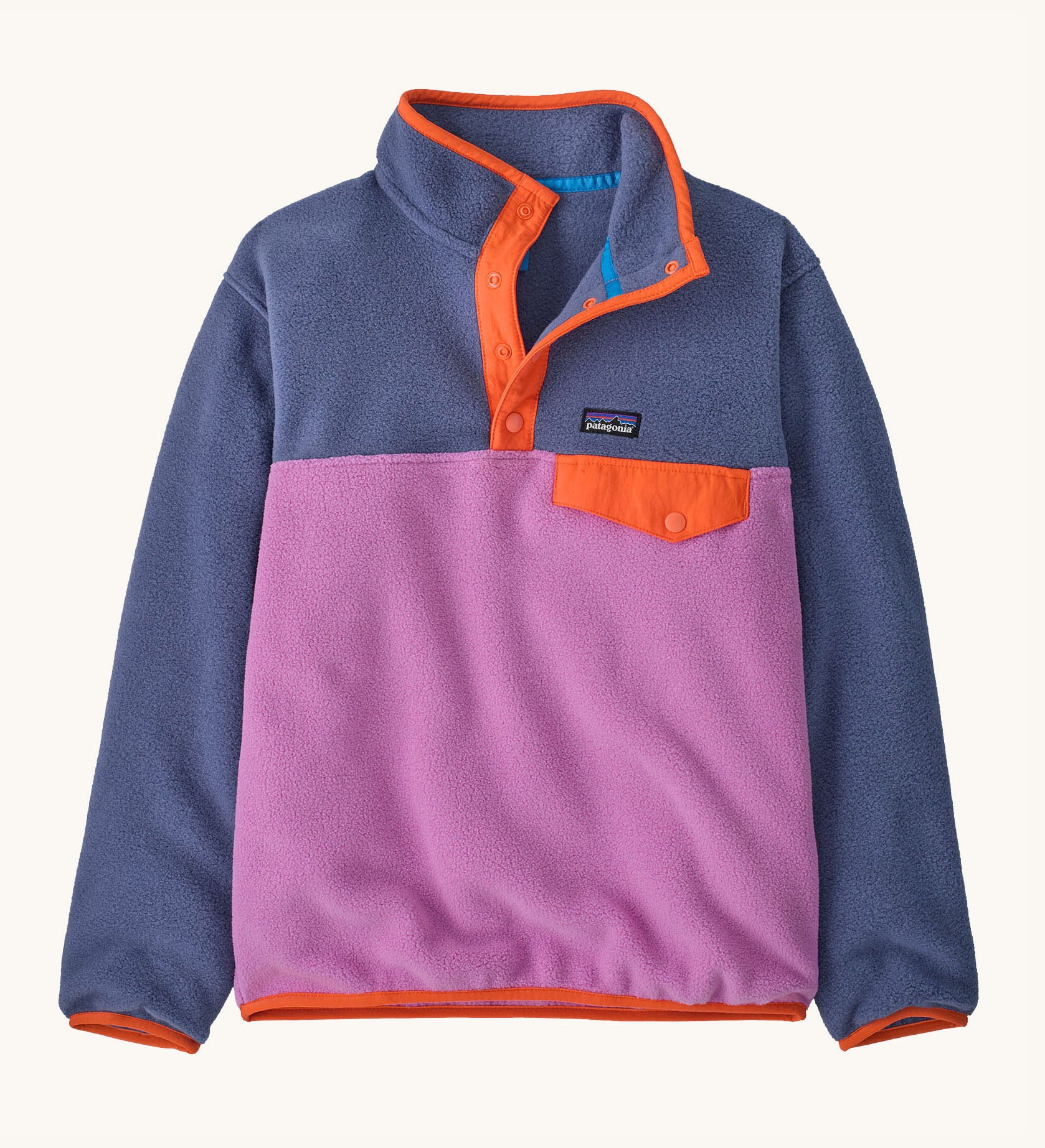 Patagonia kids synchilla pullover fleece in brisk purple. A light fleece in pastel and light purple with orange trim. Features popper fasteners and a chest pocket in yellow