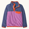 Patagonia kids synchilla pullover fleece in brisk purple. A light fleece in pastel and light purple with orange trim. Features popper fasteners and a chest pocket in yellow