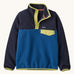 Patagonia kids synchilla pullover fleece in clement blue. A light fleece in navy and blue with yellow trim. Features popper fasteners and a chest pocket in yellow