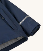 A close up of the cuff on the Patagonia navy torrentshell rain jacket showing the cuff detail