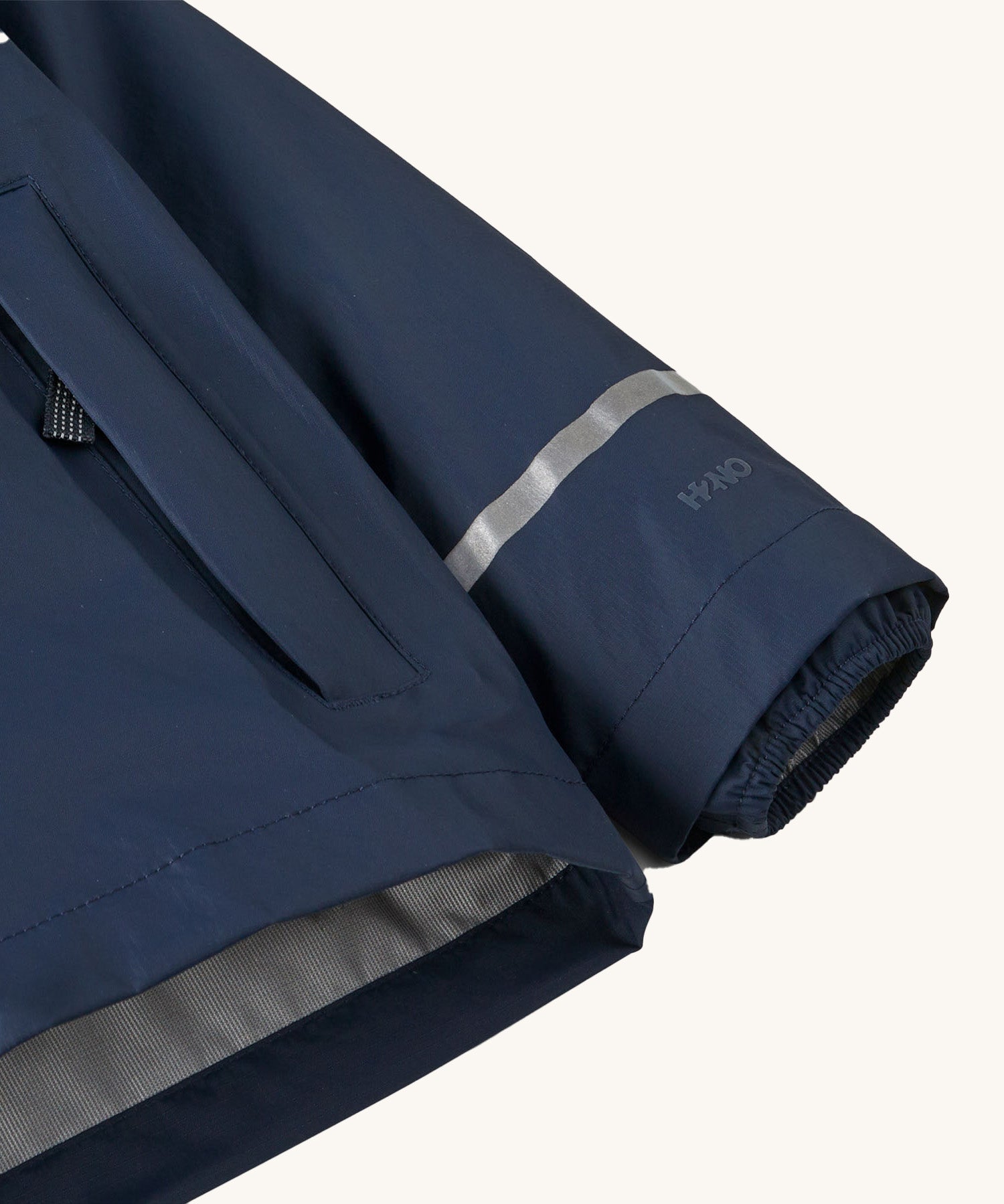 A close up of the cuff on the Patagonia navy torrentshell rain jacket showing the cuff detail