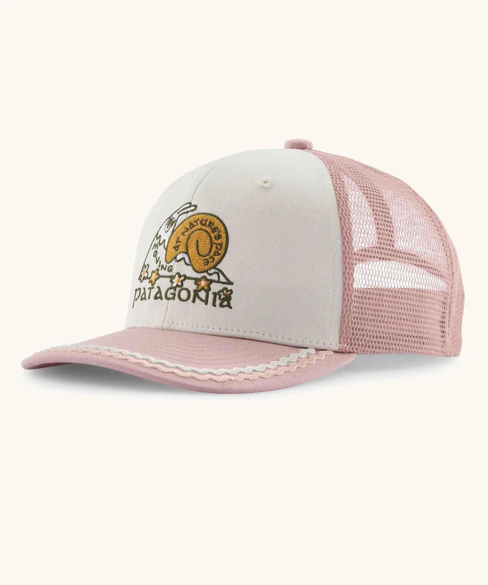 Patagonia kids trucker hat with a white organic cotton front crown with a playful snail patch, pink bill with frill and mesh back