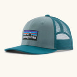 Patagonia kids trucker hat in blue sage. Organic cotton front crown with brand patch and recycled polyester mesh back