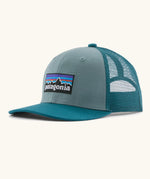 Patagonia kids trucker hat in blue sage. Organic cotton front crown with brand patch and recycled polyester mesh back
