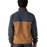 A man wearing and showing the back of the Patagonia mens deer brown synchilla jacket available at Babipur