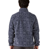 A man wearing and showing the back of the Patagonia mens synchilla jacket available at Babipur