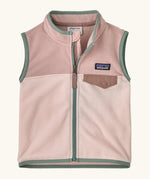 Patagonia little kids micro d fleece vest in light and dark pink with pale green trim. Features a full front zip and popper chest pocket