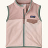 Patagonia little kids micro d fleece vest in light and dark pink with pale green trim. Features a full front zip and popper chest pocket