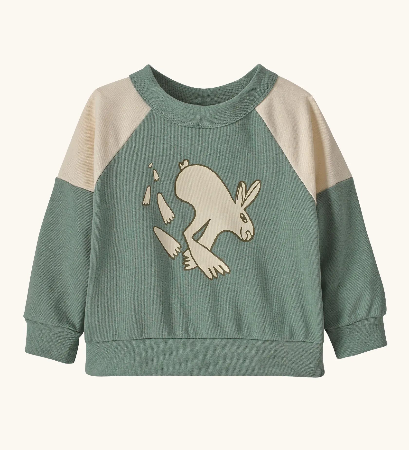 Patagonia 100% organic cotton little kids crew sweatshirt in pale green with beige shoulder panels. Showing a playful rabbit print on the front.