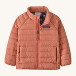 Patagonia little kids down sweater in moment pink. A 100% recycled down jacket in pale pink. Features a padded collar and full length zip