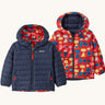 Patagonia Kids Reversible Down Hoody in forest being sizzle red design side by side showing the different colour and print detail.
