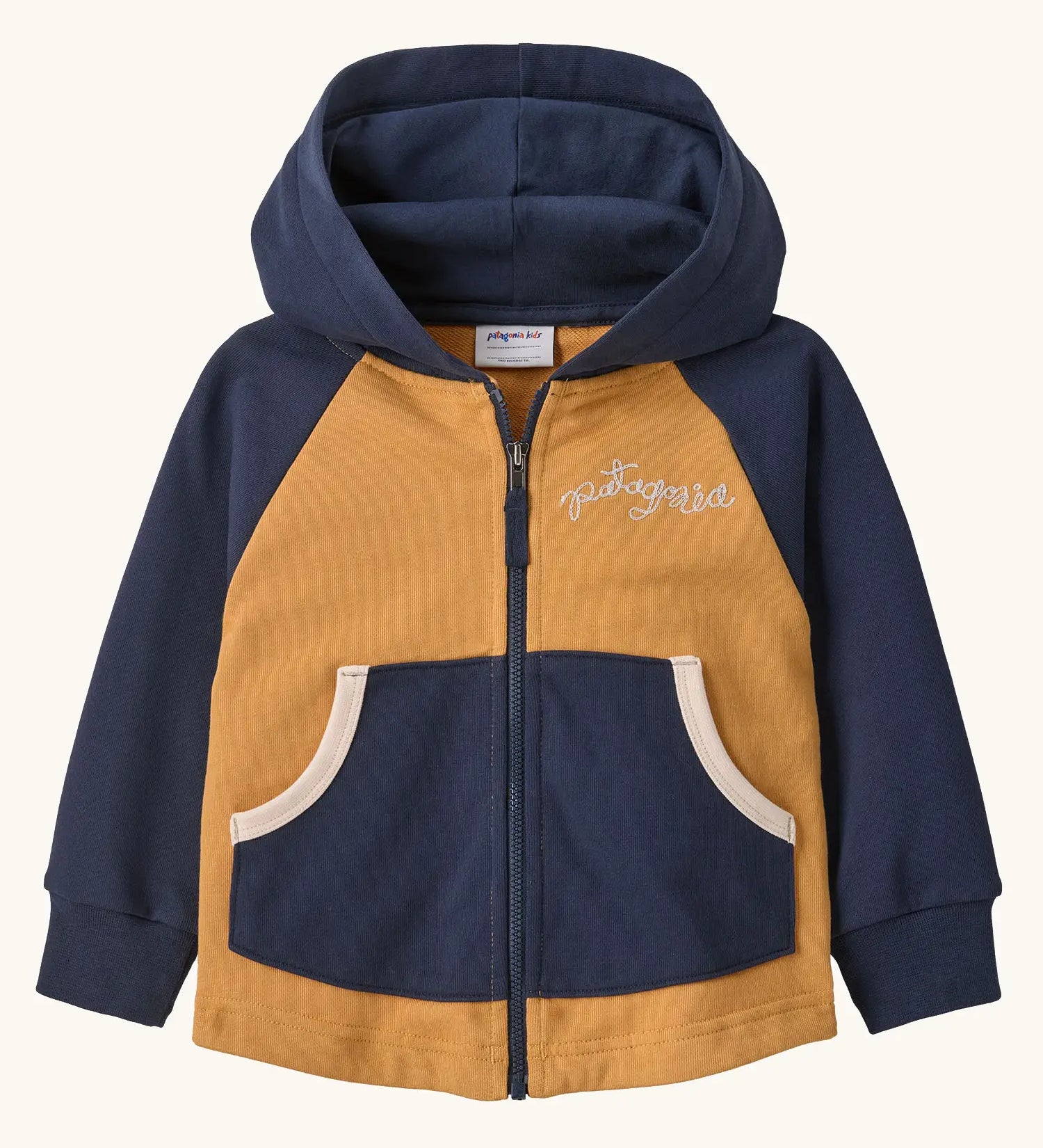 Patagonia 100% organic cotton little kids full zip hoody in warm mango with blue raglan sleeves. Features front pockets