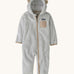 Patagonia little kids furry fiends bunting suit in crisp grey available at Babipur. A 100% recycled polyester thick fleece all in one in light grey with light brown trim and matching bear like ears on the hood. Features a full length zip, elasticated cuffs and a small chest pocket