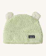 Patagonia little kids friends hat in lichen green available at Babipur. A 100% polyester fluffy beanie in pale green with white bear like ears on top.
